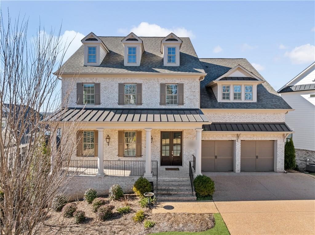 Charleston-style front with a deep porch in Hillandale, Roswell