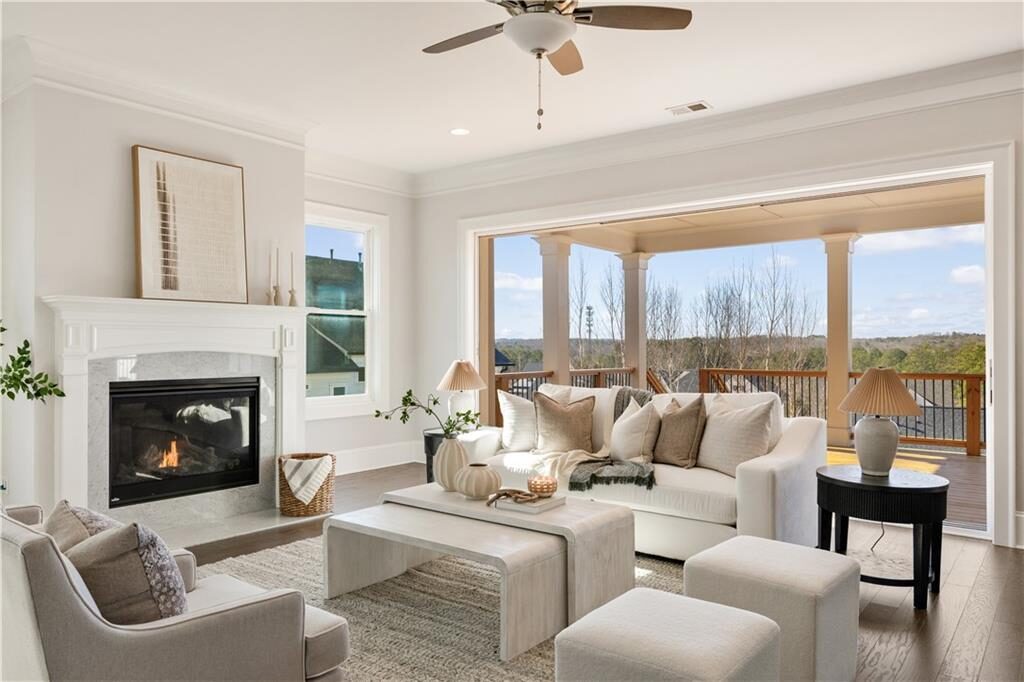 Family room with fireplace and porch views
