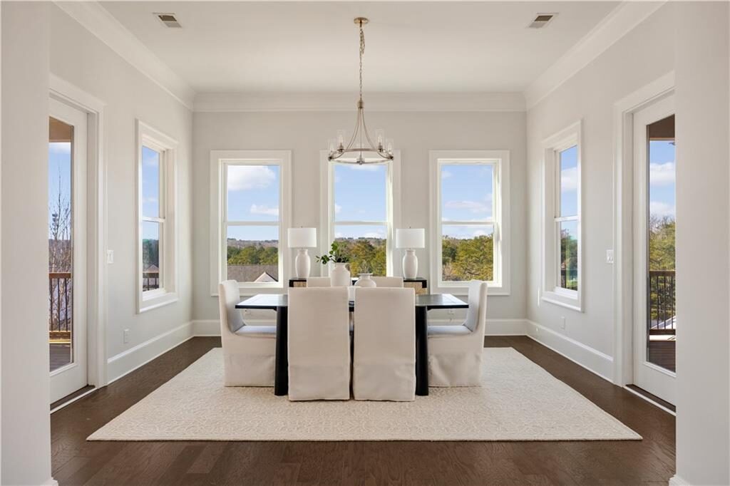 Dining room with windows on three sides