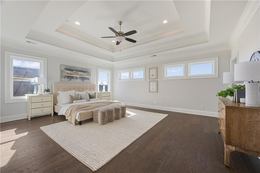 Primary bedroom with tray ceiling