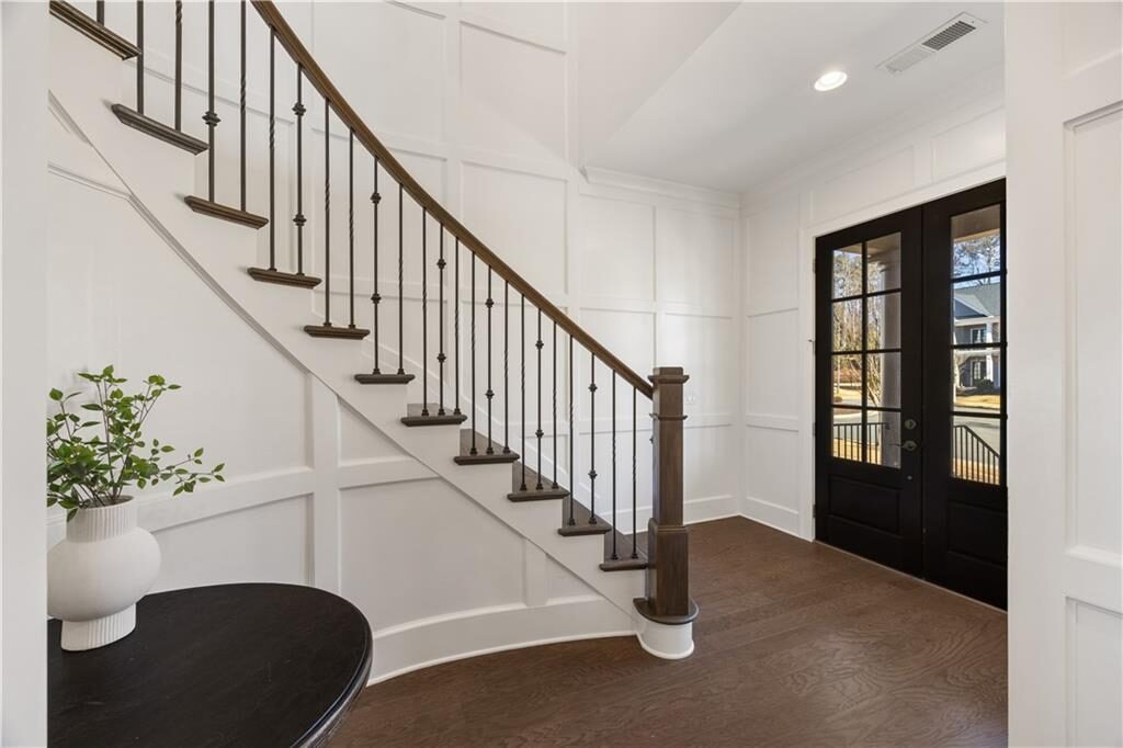 Curved staircase in the foyer