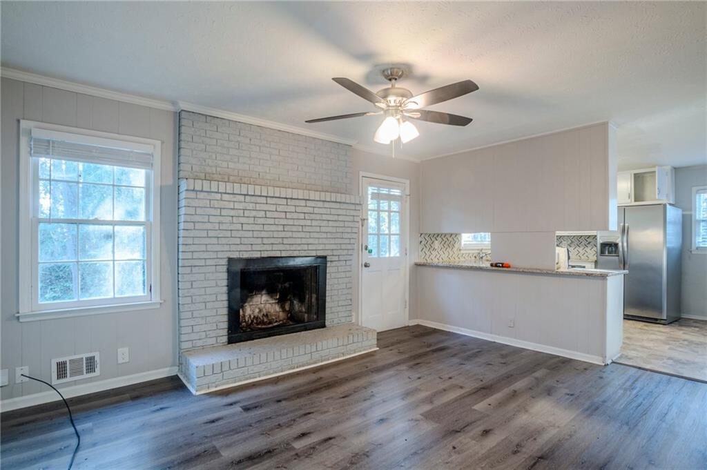 Family room with brick fireplace