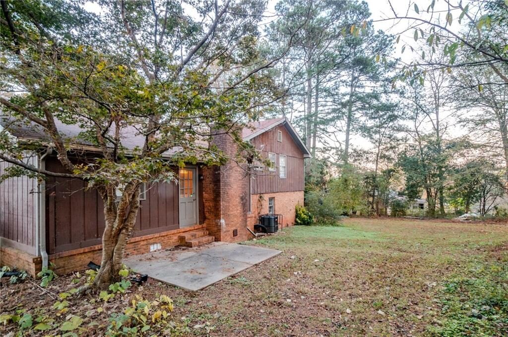Side yard and back of the home