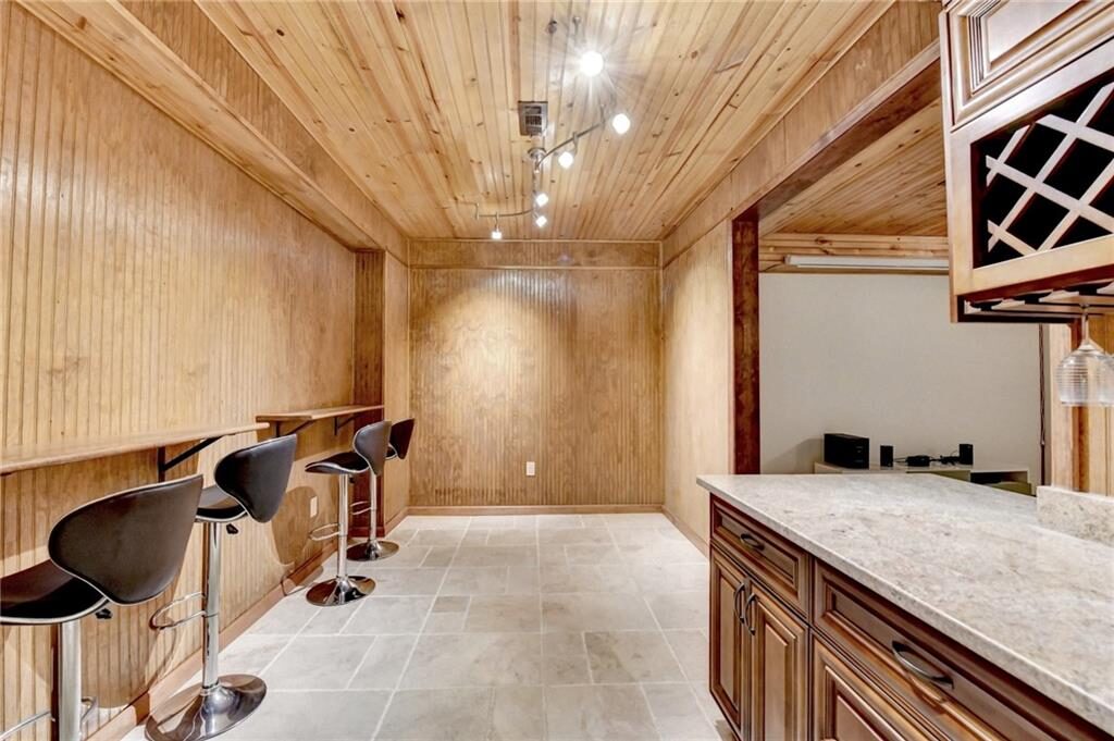 Wood-paneled bar in the basement