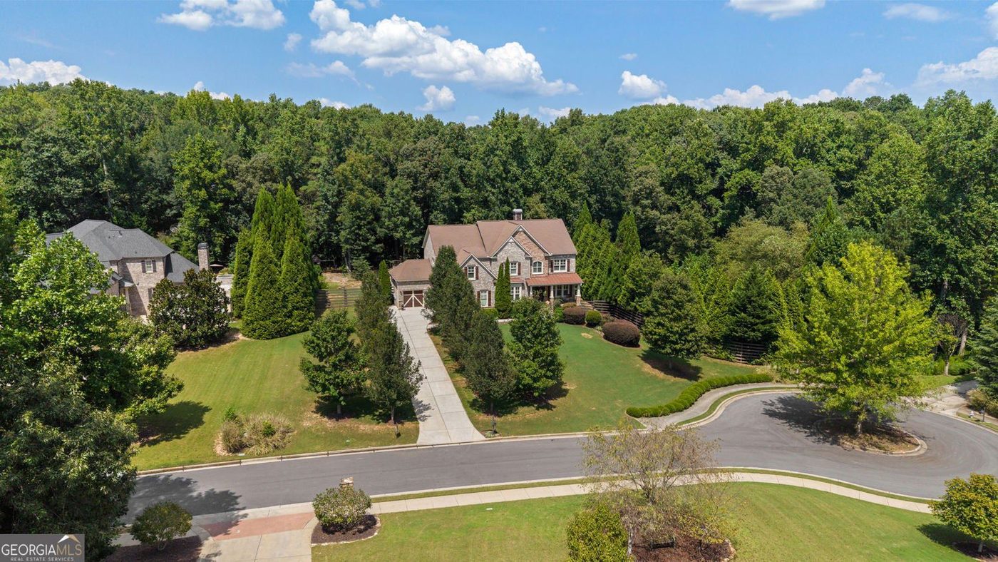 Aerial view of the private drive and lot